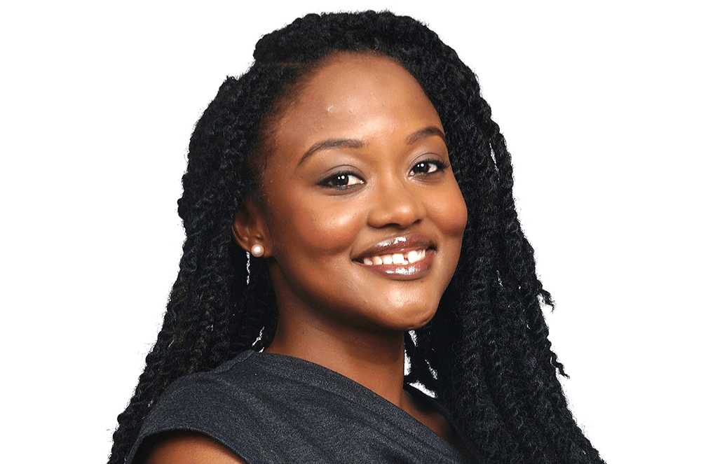 Woman in dark gray top smiling