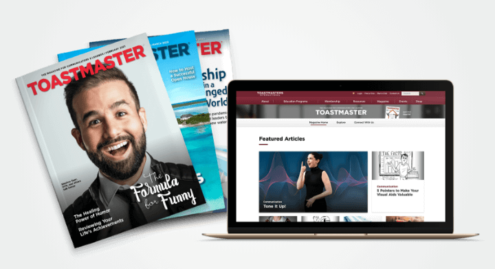 Toastmasters magazine on a laptop