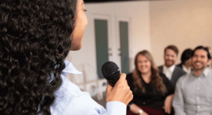 Woman speaking with microphone